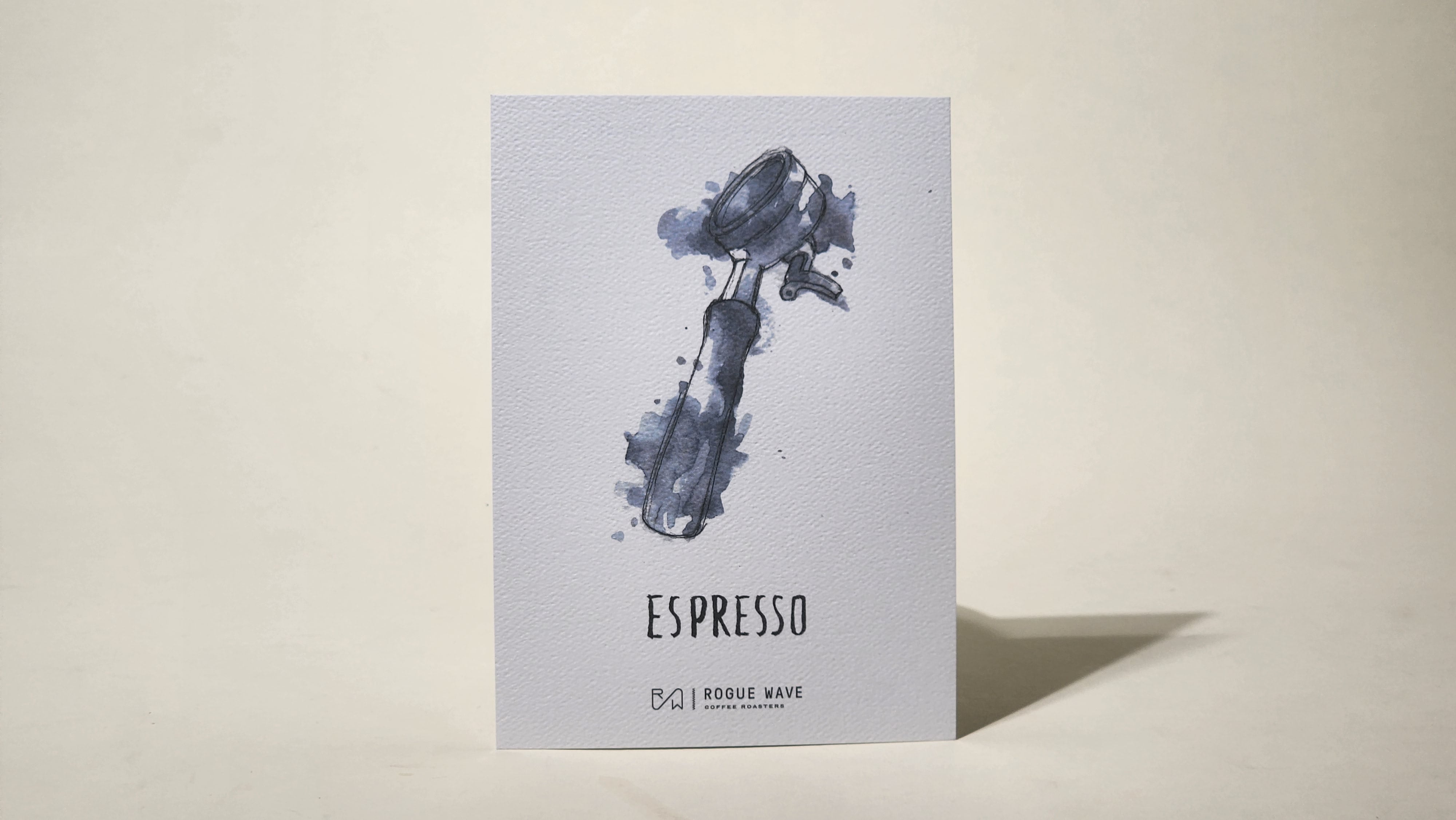 LAMOSE coffee brew guide card, white textured paper with blue watercolor portafilter illustration, 'ESPRESSO' text & Rogue Wave logo, front view.