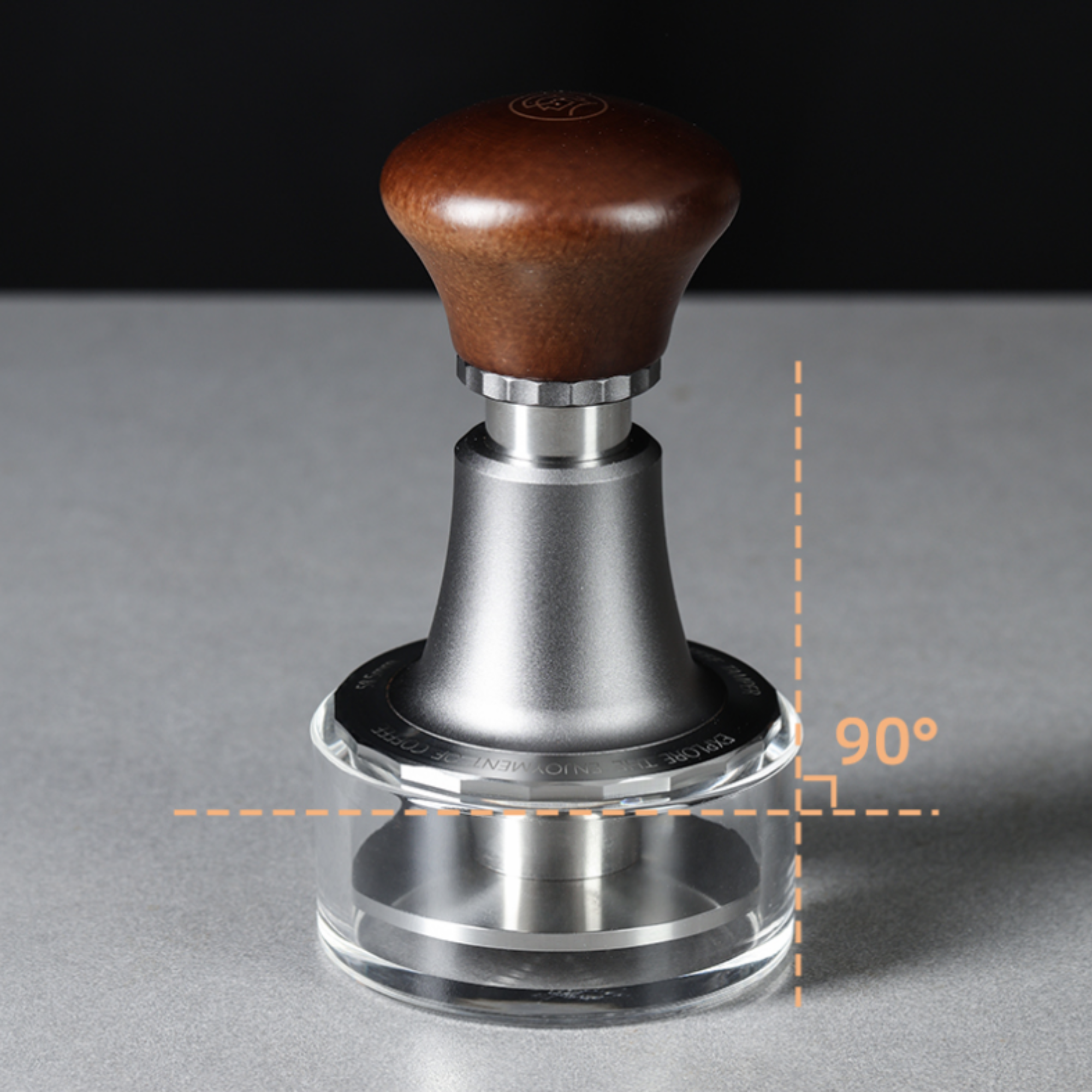 Adjustable espresso tamper with ergonomic wooden handle, stainless steel base, and 90-degree precision leveling stand for consistent coffee puck compression.