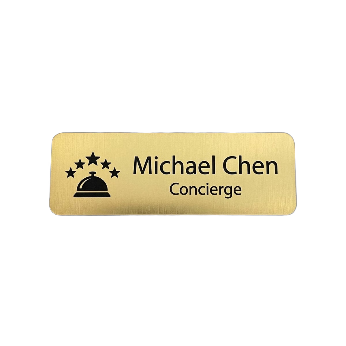 Hotel & Hospitality Name Tag — Concierge / Front Desk / Guest Services — LAMOSE custom laser-engraved professional name tag, Trotec Trolase two-layer acrylic laminate (1.5 × 3 in.) in Brushed Gold with Black engraving, made in Calgary, Canada since 2017.