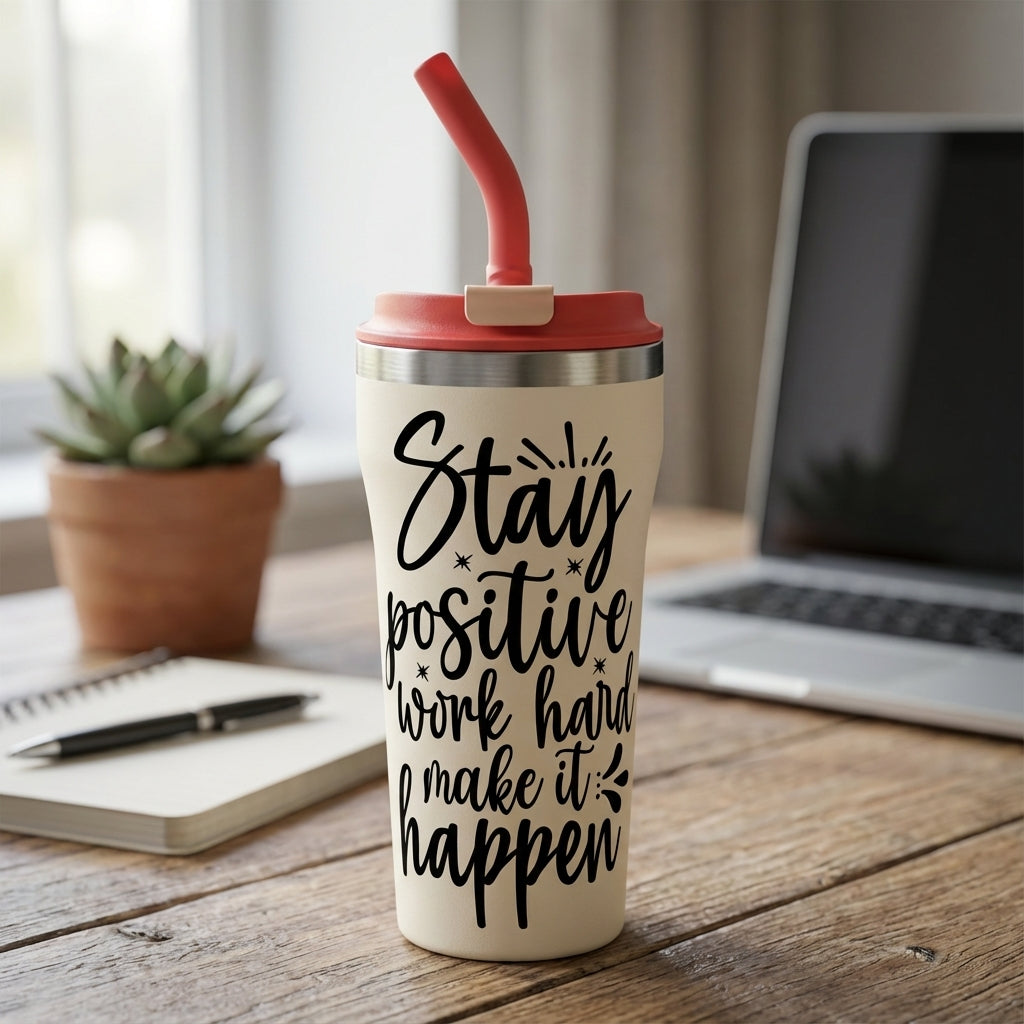 Beige 16oz insulated tumbler with motivational quote stay positive work hard make it happen and coral lid on a modern office desk with notebook and succulent.