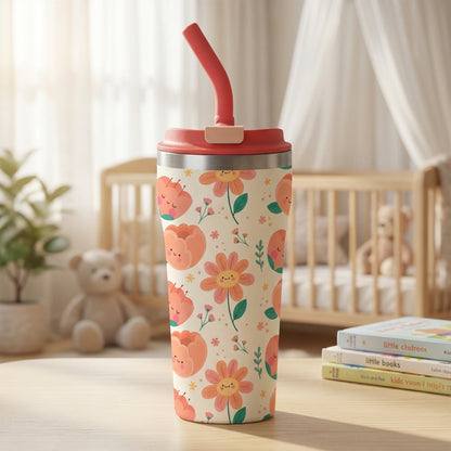 Cream colored 16oz tumbler featuring a pattern of cartoon peaches with happy faces and white daisies, topped with a coral lid and straw.