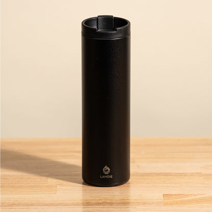 LAMOSE Grouse 20 oz insulated tumbler in onyx, matte metal finish, front view with the lid open and logo visible.