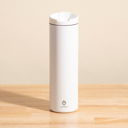 LAMOSE Grouse 20 oz insulated bottle in snow white, front view, featuring a flip-top lid and logo.