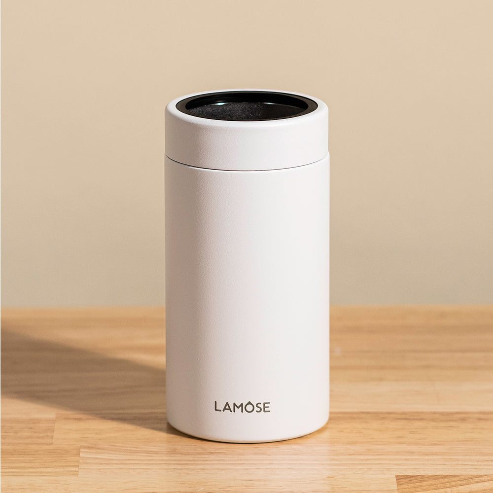 LAMOSE Logan 16 oz white double-wall stainless steel tumbler, open top with black trim, front view with logo.