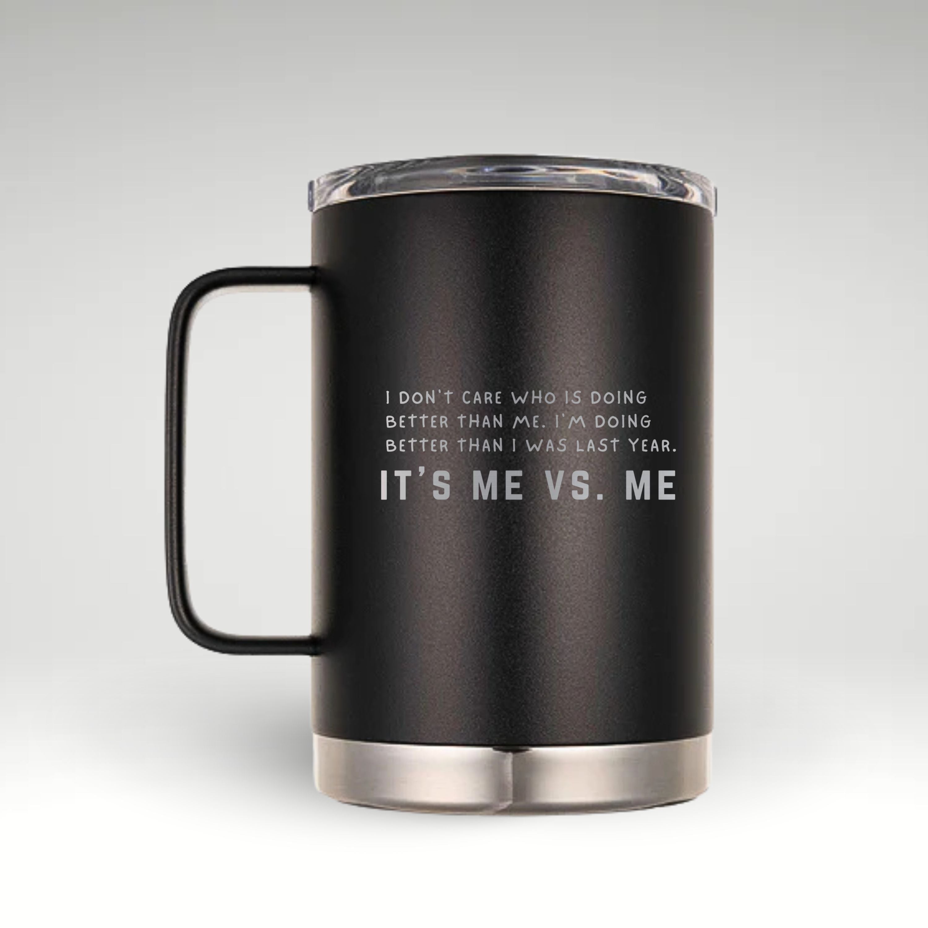 Inspire Your Journey with Every Sip Insulated mug with motivational quote IT'S ME VS. ME on a light background, perfect for personal growth and self-improvement. #color_onyx