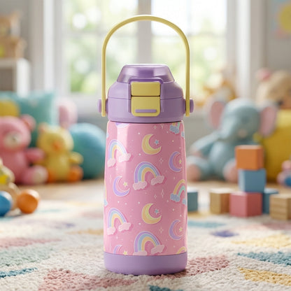Pink 14oz kids water bottle featuring pastel rainbows, crescent moons, and stars pattern with a lavender lid and yellow handle.