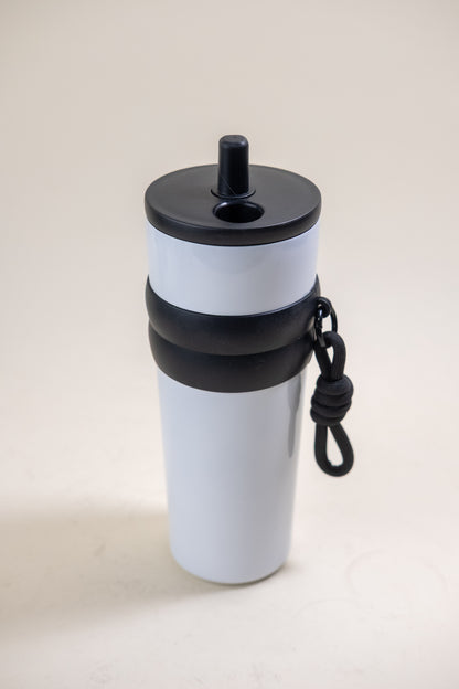 Elegant white and black stainless steel straw tumbler equipped with a BPA-free black plastic straw and a black rubber grip, complete with a practical carrying rope for easy transport. 