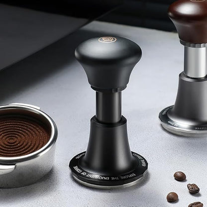 Premium adjustable espresso tamper with ergonomic black handle, stainless steel base, and precision leveling design for even coffee puck compression.