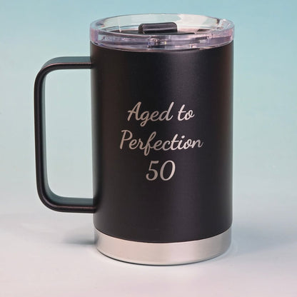 LAMOSE Hudson Pro Max 24 oz, an onyx black insulated mug with a handle and clear lid, engraved 'Aged to Perfection 50'.