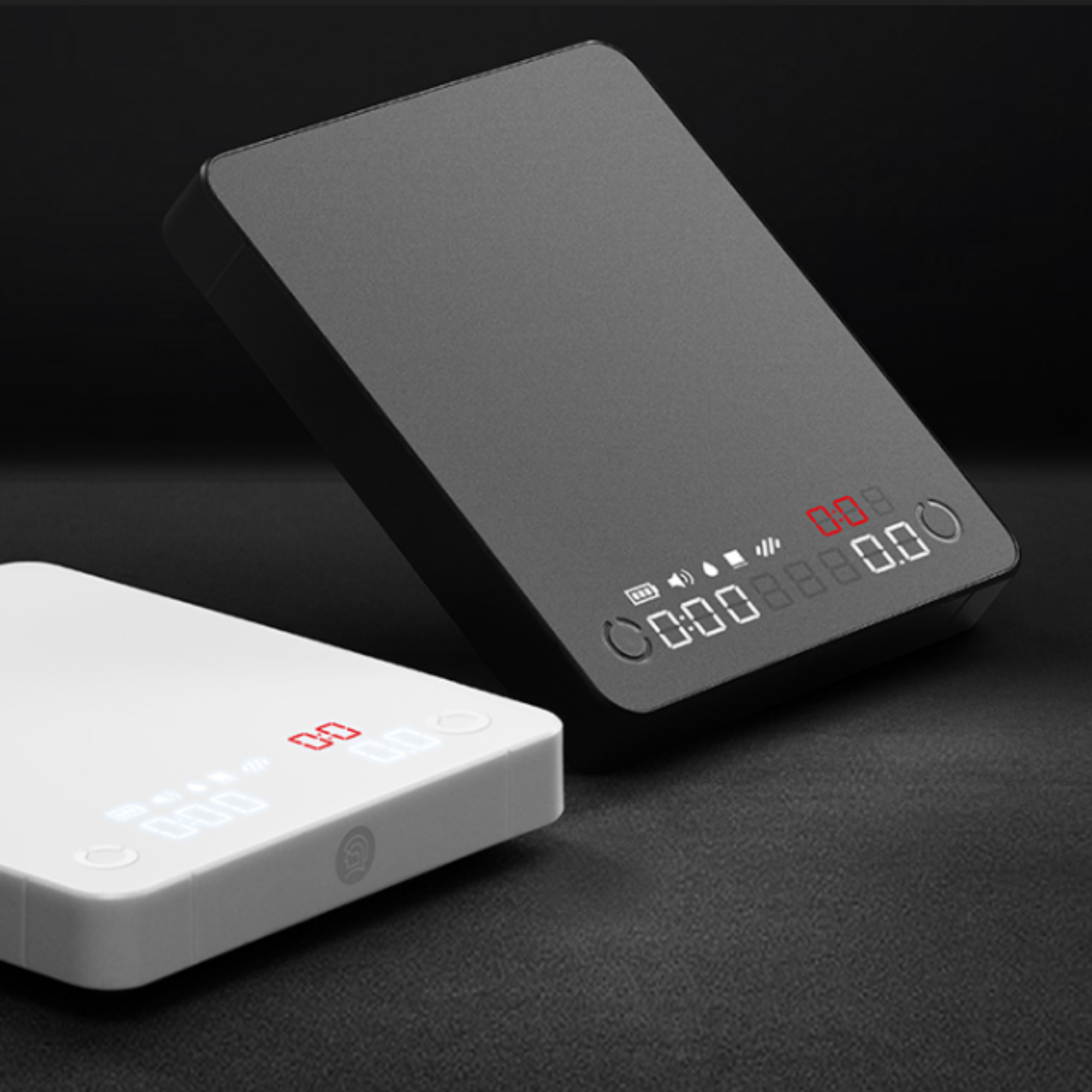 LAMOSE zeroHero mini e-smart scales in black and white, angled view with LED displays and touch controls for brewing.