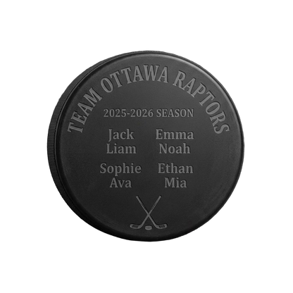 Custom Team Roster Engraved Hockey Puck — laser-engraved hockey puck, tonal black-on-black engraving on vulcanized rubber, made in Calgary