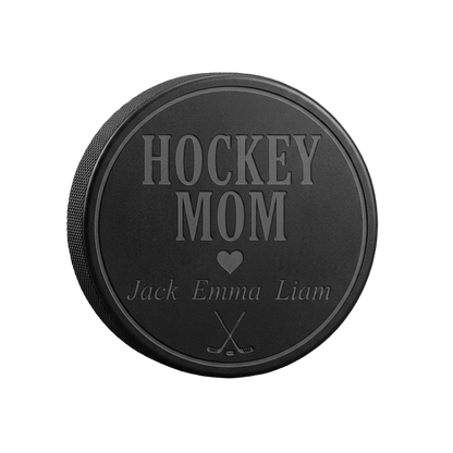 "Hockey Mom" + Kids' Names Engraved Hockey Puck — laser-engraved hockey puck, tonal black-on-black engraving on vulcanized rubber, made in Calgary