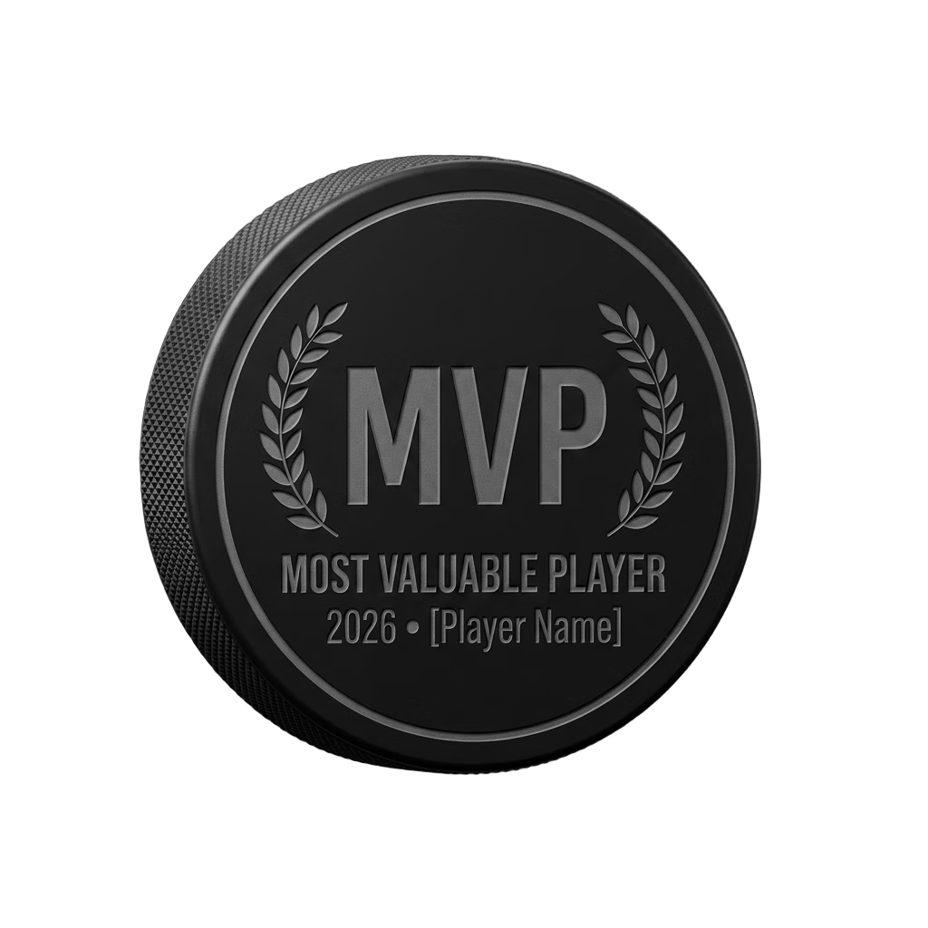 "MVP" Most Valuable Player Engraved Hockey Puck Award — laser-engraved hockey puck, tonal black-on-black engraving on vulcanized rubber, made in Calgary