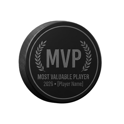 "MVP" Most Valuable Player Engraved Hockey Puck Award — laser-engraved hockey puck, tonal black-on-black engraving on vulcanized rubber, made in Calgary