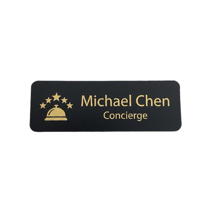Hotel & Hospitality Name Tag — Concierge / Front Desk / Guest Services in Black / Gold — LAMOSE custom laser-engraved professional name tag, Trotec Trolase two-layer acrylic laminate (1.5 × 3 in.), made in Calgary, Canada since 2017.