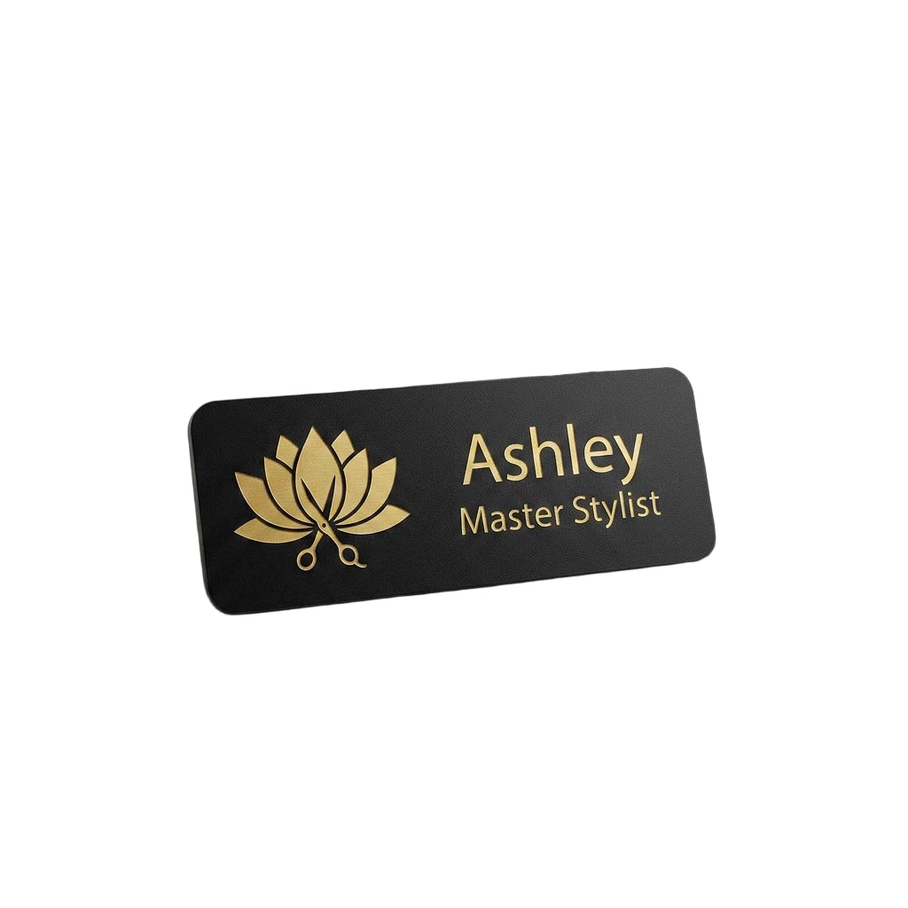 Salon & Spa Name Tag — Stylist / Therapist / Receptionist (Custom) in Black / Gold — LAMOSE custom laser-engraved professional name tag, Trotec Trolase two-layer acrylic laminate (1.5 × 3 in.), made in Calgary, Canada since 2017.