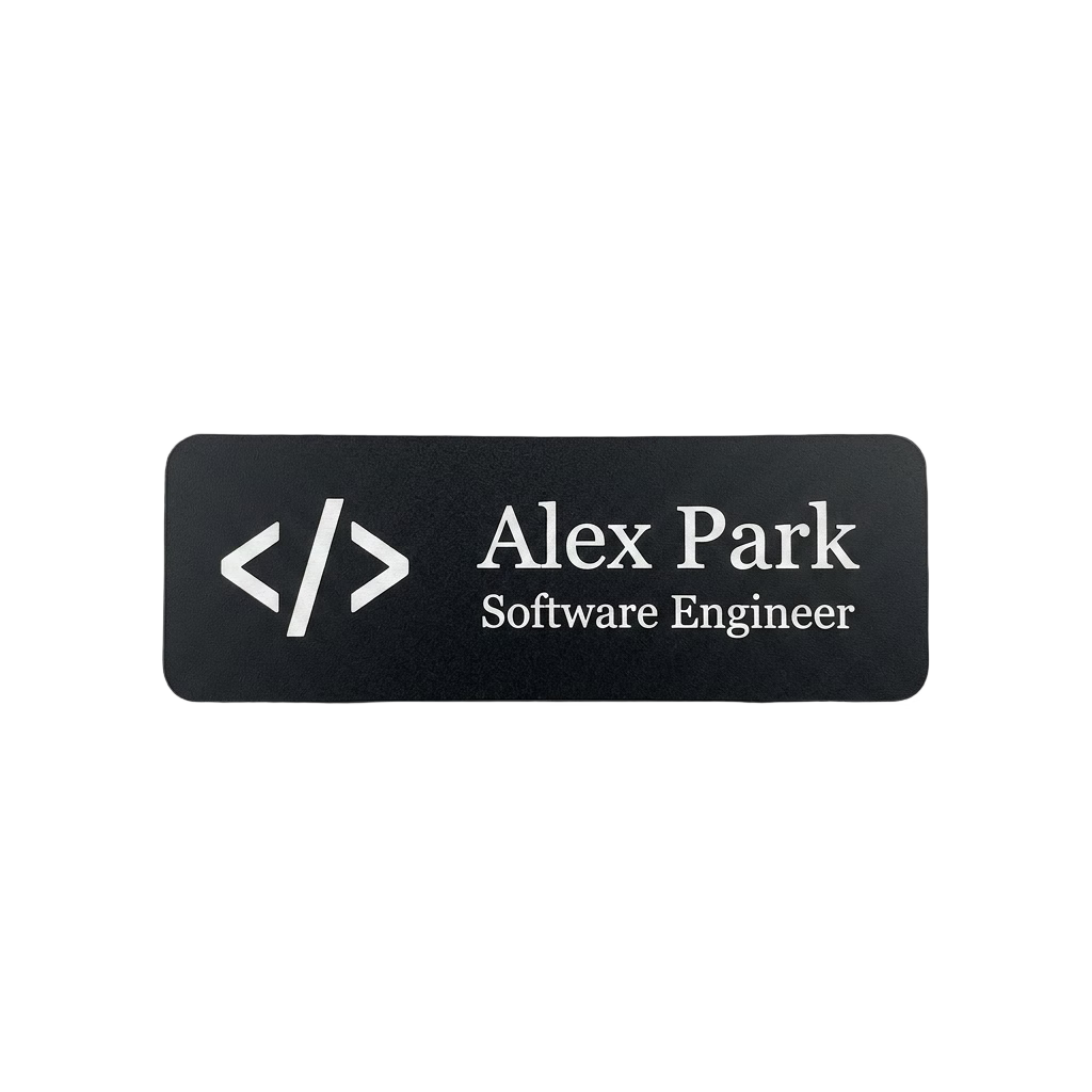Tech Startup Name Tag — Engineer / PM / Designer (Custom) in Black / White — LAMOSE custom laser-engraved professional name tag, Trotec Trolase two-layer acrylic laminate (1.5 × 3 in.), made in Calgary, Canada since 2017.