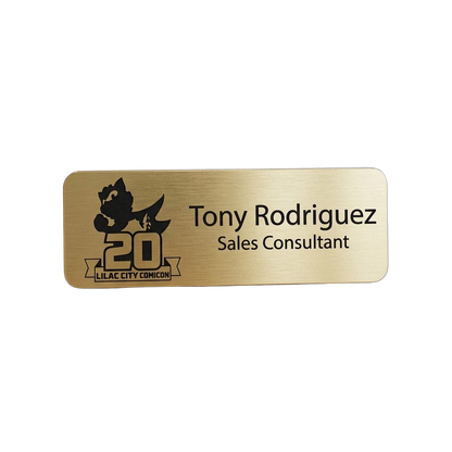 Auto Dealership Name Tag — Sales / Service / Finance (Custom) — LAMOSE custom laser-engraved professional name tag, Trotec Trolase two-layer acrylic laminate (1.5 × 3 in.) in Brushed Gold with Black engraving, made in Calgary, Canada since 2017.