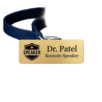 Conference Speaker & Staff Name Tag — Event Badge (Custom) — LAMOSE custom laser-engraved professional name tag, Trotec Trolase two-layer acrylic laminate (1.5 × 3 in.) in Brushed Gold with Black engraving, made in Calgary, Canada since 2017.