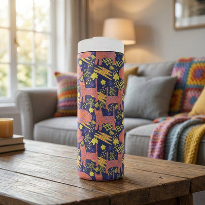 Deep blue 16oz insulated tumbler featuring a repeating pattern of spotted orange cats, yellow shapes, and purple star flowers.