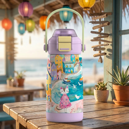 LAMOSE Goose 14oz kids water bottle featuring a watercolor coastal town scene, a cat in a dress on the beach, and a light purple lid with green handle.