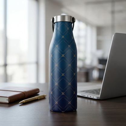 LAMOSE Robson 21 oz insulated water bottle in dark navy blue with gold diamond pattern sitting on a modern office desk next to a laptop.