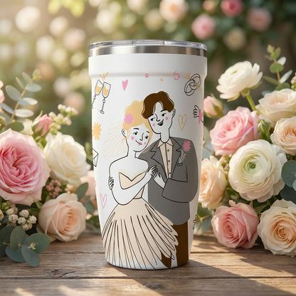 White 16oz insulated travel cup featuring a cartoon bride and groom illustration, surrounded by hearts, wedding rings, and champagne glasses.