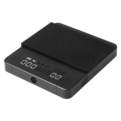 LAMOSE zeroHero mini smart scale in black, angled view. Features an LED display, precision sensors, and a textured heat-resistant silicone pad.